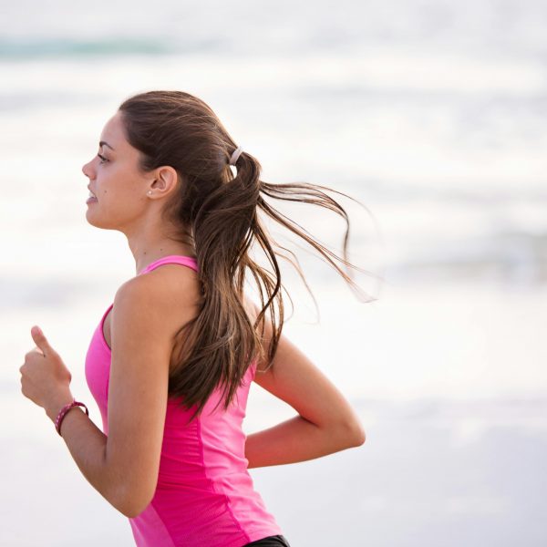 woman running on the beach